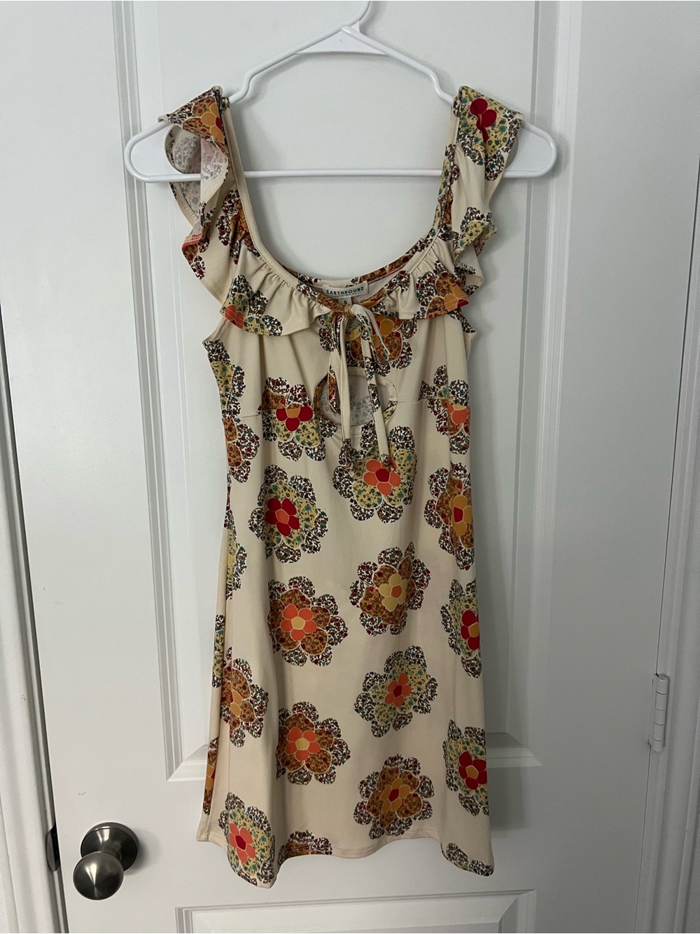 EARTHBOUND Cream Floral Tie-Neck Blouse with Mustard Accents - Picture 1 of 3